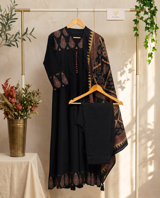 Anokhi Sonam — black suit with rust-orange handblock medallion prints — Ivory Hues, Indian ethnic wear Singapore