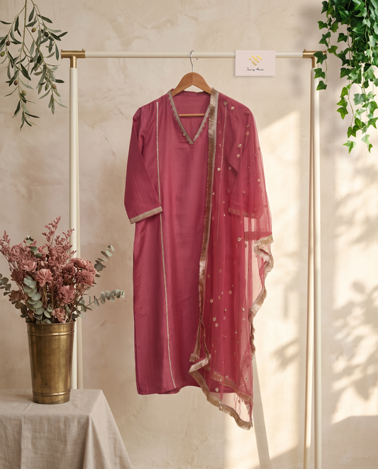 Noor Begum — rose-mauve dola silk suit with embroidered V-neckline — Ivory Hues, Indian ethnic wear Singapore