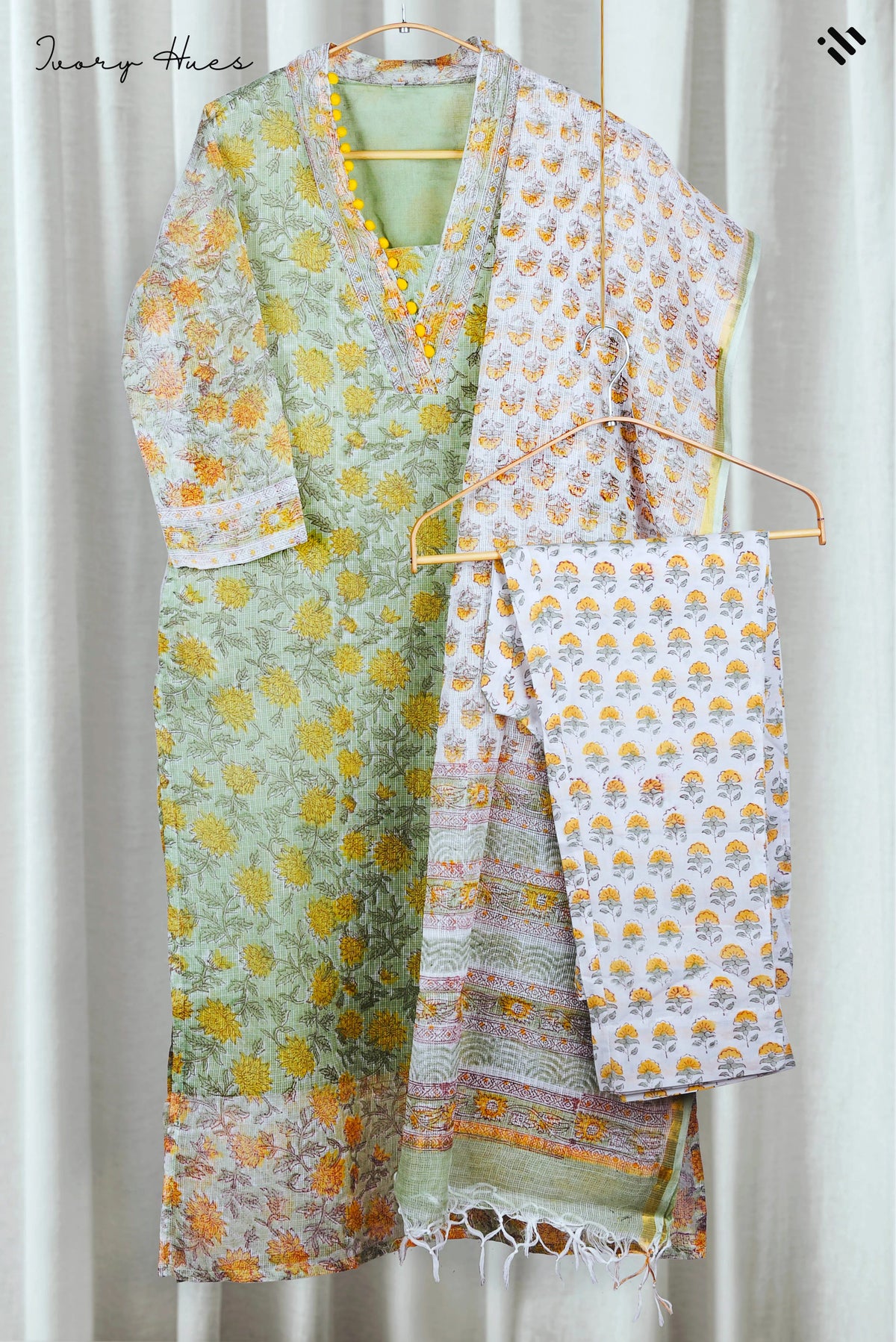 Kota Kainaat Hoor — mint green Kota doria suit with contrast potli buttons — Ivory Hues, Indian ethnic wear Singapore
