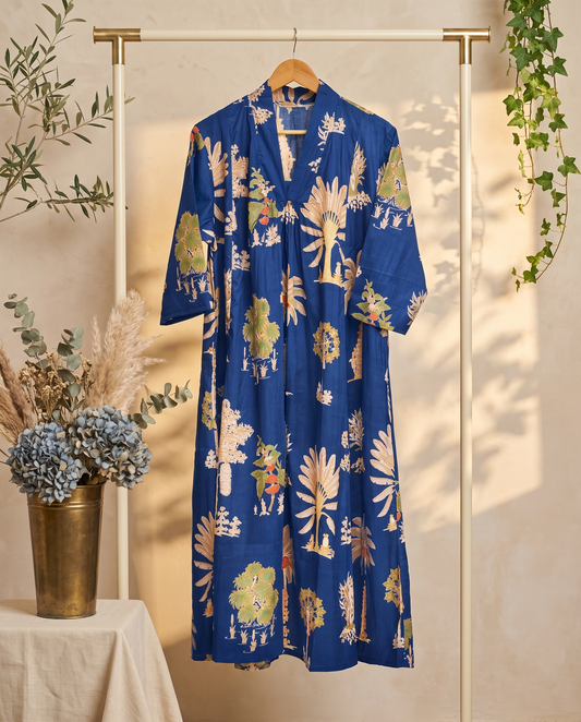 Fiza 3.0 Tropical Blue — blue poppy-print cotton dress with V-neckline and pockets — Ivory Hues, Indian ethnic wear Singapore