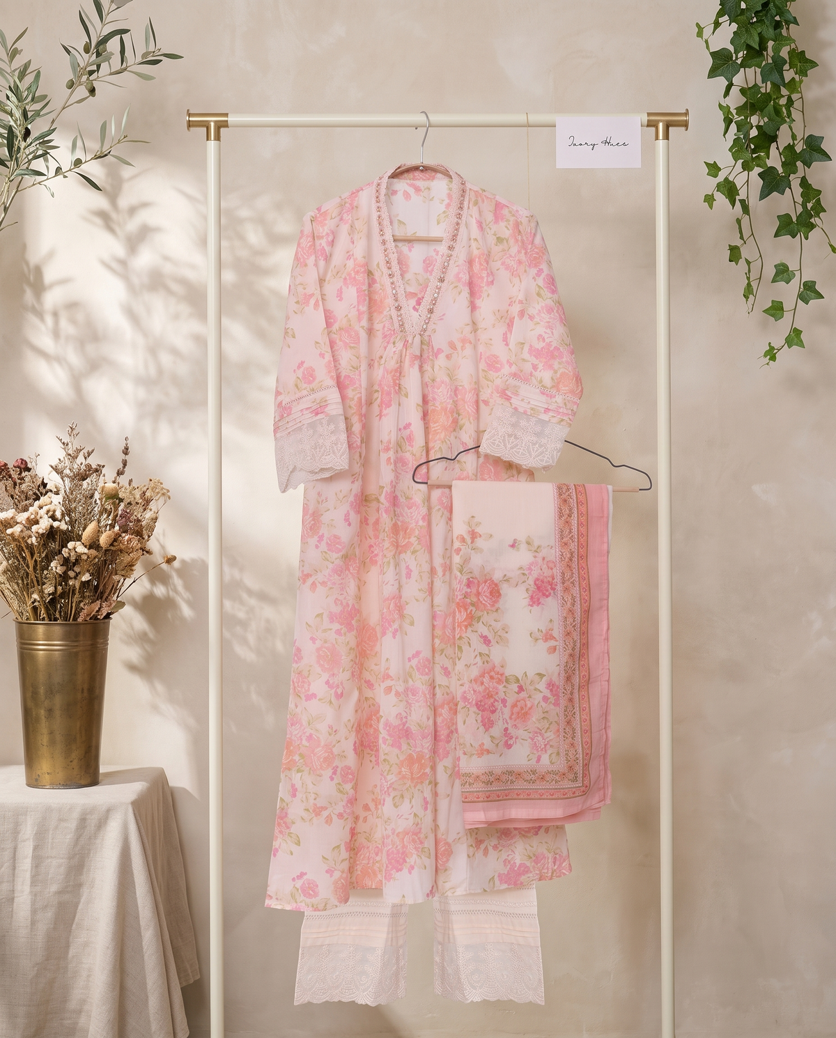 Anokhi Katha — off-white suit with pastel floral print and lace detailing — Ivory Hues, Indian ethnic wear Singapore