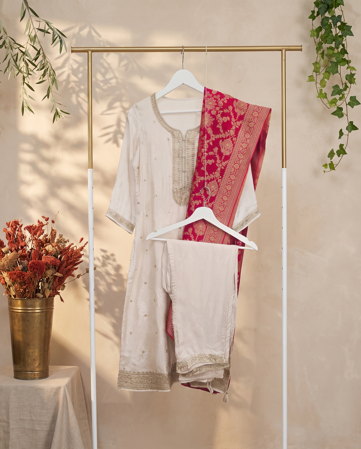 Noor Naira — off-white jacquard silk suit with red-magenta brocade dupatta — Ivory Hues, Indian ethnic wear Singapore