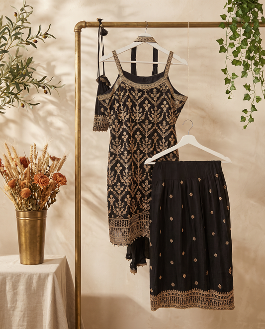 Noor Noir — black sleeveless suit with sharara pants and golden buttas — Ivory Hues, Indian ethnic wear Singapore