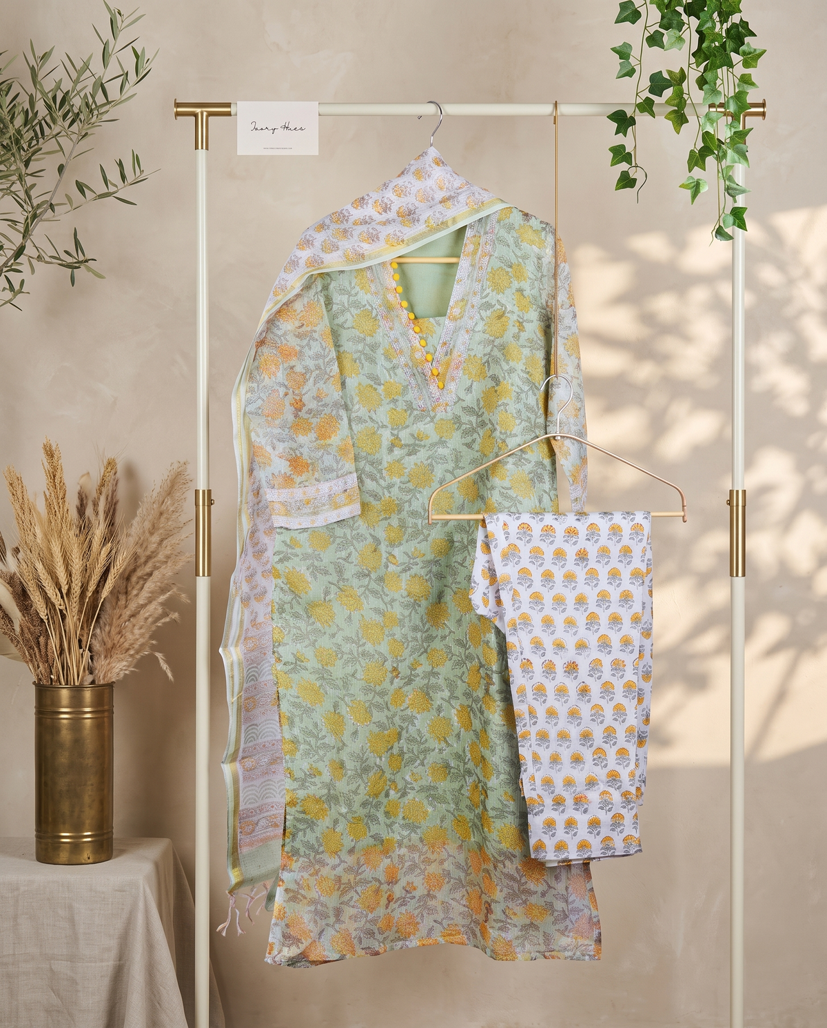 Kota Kainaat Hoor — mint green Kota doria suit with contrast potli buttons — Ivory Hues, Indian ethnic wear Singapore