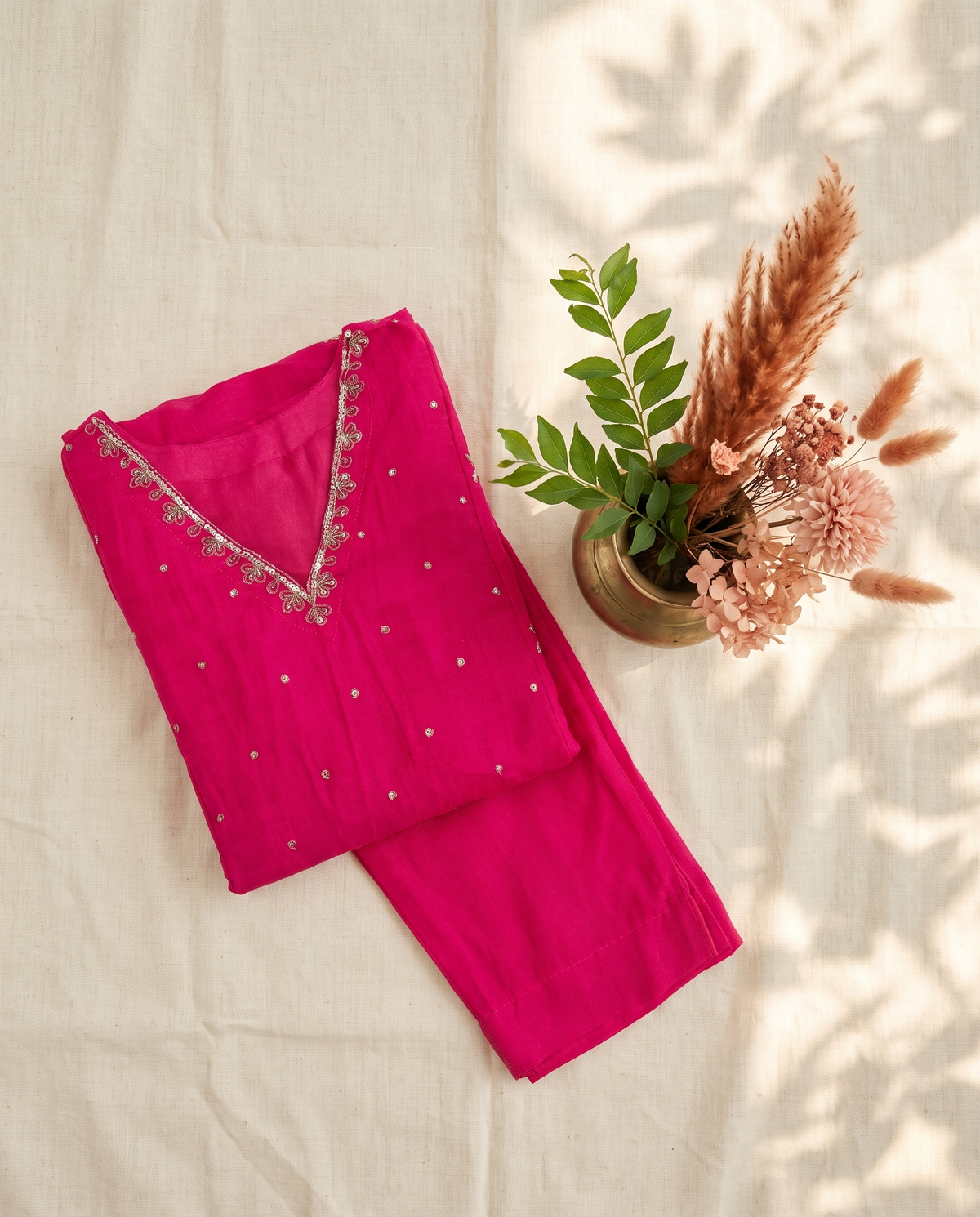 Noor Ishq — rani pink mul Chanderi suit with embroidered neckline and sleeves — Ivory Hues, Indian ethnic wear Singapore