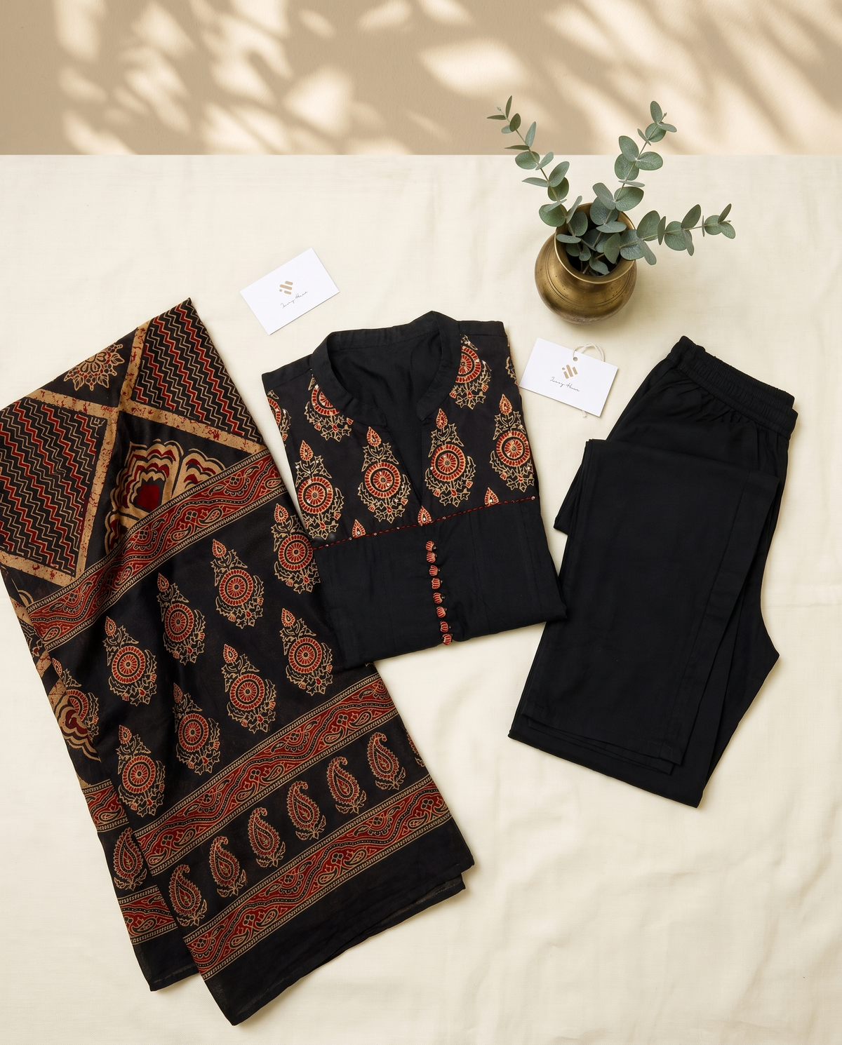Anokhi Sonam — black suit with rust-orange handblock medallion prints — Ivory Hues, Indian ethnic wear Singapore