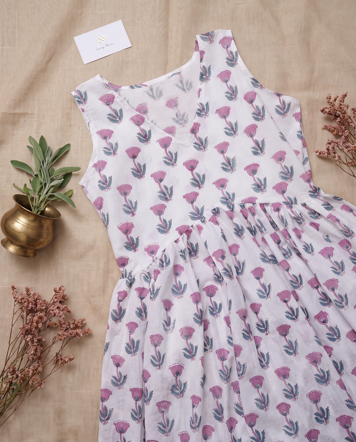 Indira Mehak — white cotton peplum top with mauve floral print — Ivory Hues, Indian ethnic wear Singapore