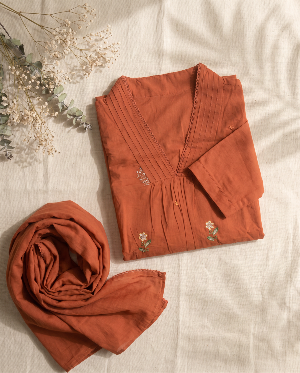 Anokhi Vasundhara — three-piece rust cotton suit with embroidery and lace detailing — Ivory Hues, Indian ethnic wear Singapore