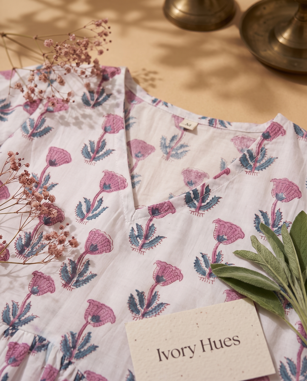 Indira Mehak — white cotton peplum top with mauve floral print — Ivory Hues, Indian ethnic wear Singapore