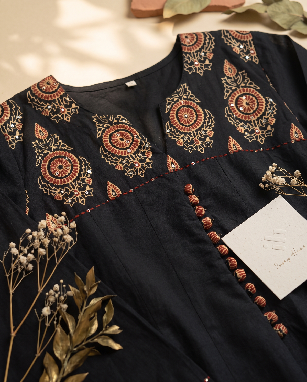 Anokhi Sonam — black suit with rust-orange handblock medallion prints — Ivory Hues, Indian ethnic wear Singapore
