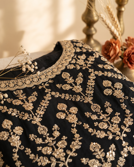 Noor Noir — black sleeveless suit with sharara pants and golden buttas — Ivory Hues, Indian ethnic wear Singapore