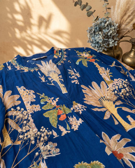 Fiza 3.0 Tropical Blue — blue poppy-print cotton dress with V-neckline and pockets — Ivory Hues, Indian ethnic wear Singapore