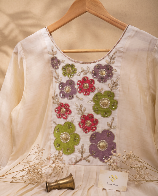 Noor Aria — off-white mul Chanderi suit with colorful floral embroidery — Ivory Hues, Indian ethnic wear Singapore