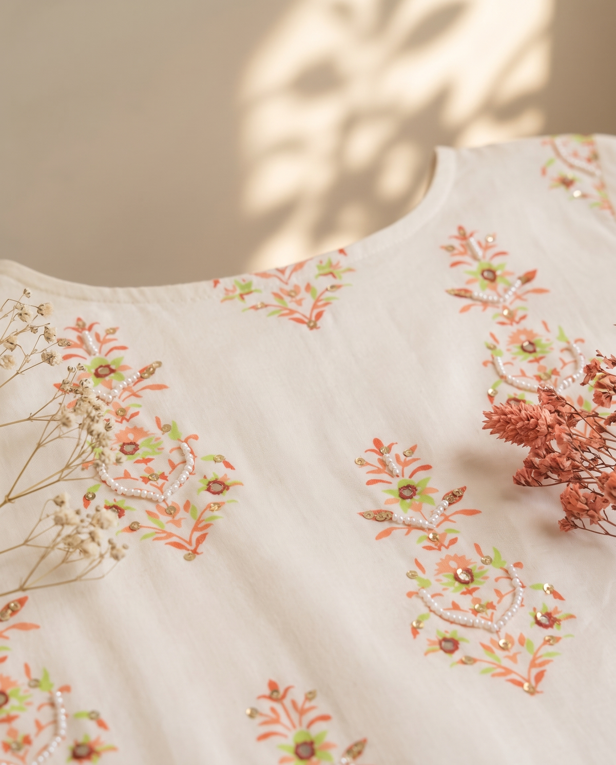 Leher Nargis — cotton jumpsuit with orange handblock print and waist belt — Ivory Hues, Indian ethnic wear Singapore