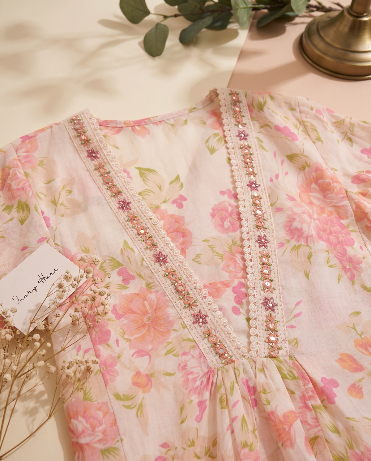 Anokhi Katha — off-white suit with pastel floral print and lace detailing — Ivory Hues, Indian ethnic wear Singapore
