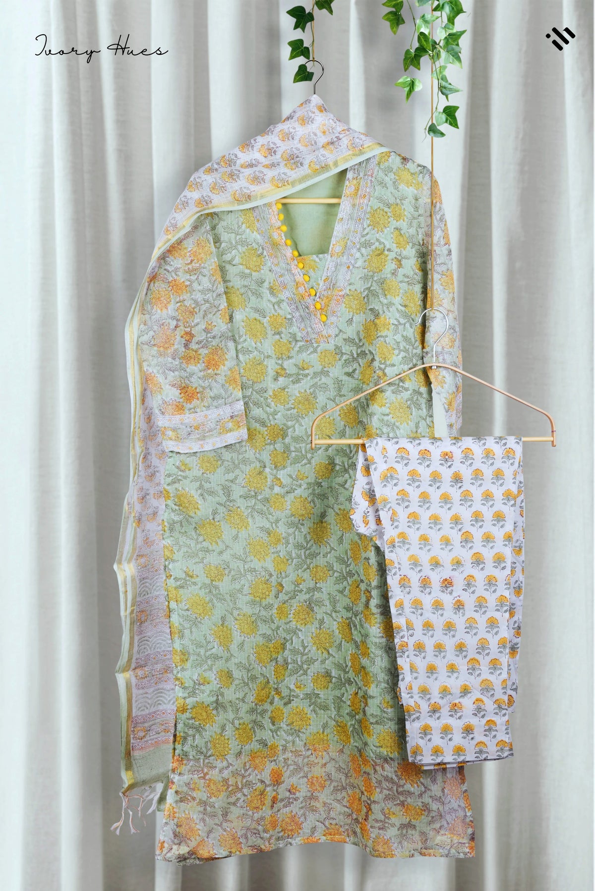Kota Kainaat Hoor — mint green Kota doria suit with contrast potli buttons — Ivory Hues, Indian ethnic wear Singapore